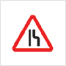 Sign: Road narrows from right