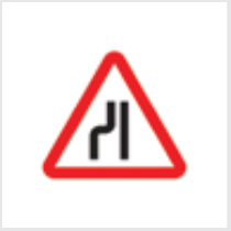 Sign: Road narrows from left